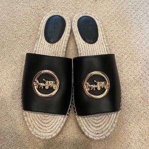 Coach slides with gold accents